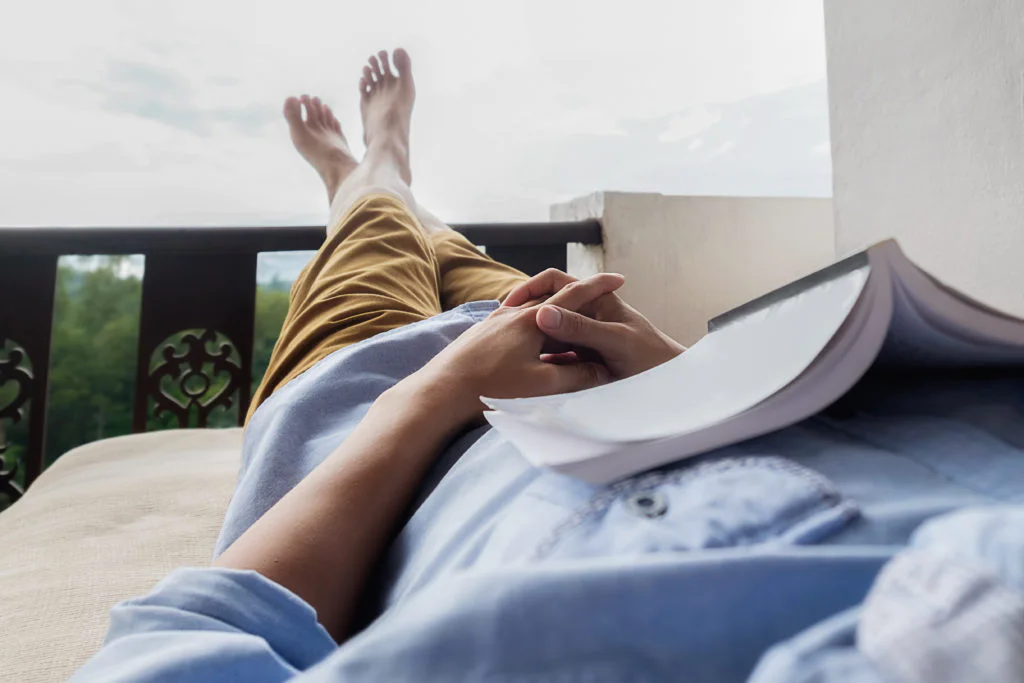 Man reading book in peaceful, clean environment