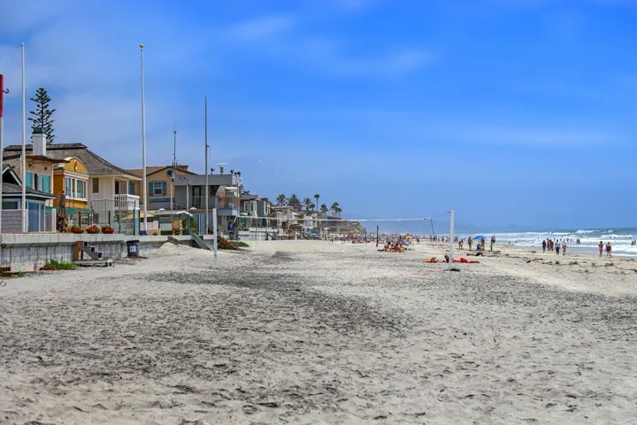 Del Mar Beach with beautiful coastal homes overlooking pristine beaches